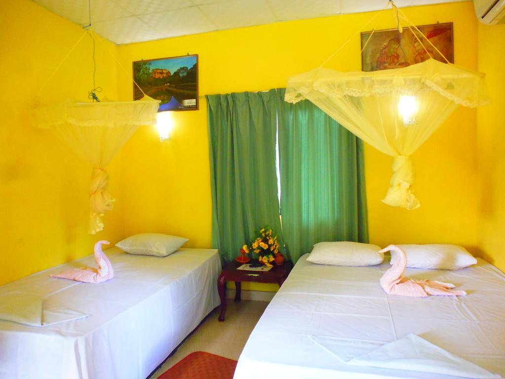 The Nilmini Lodge Sigiriya Pokoj fotografie